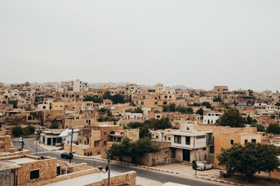 AI-generated travel thumbnail for Al Karāmah