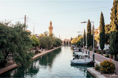 AI-generated travel thumbnail for Buşayrā