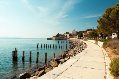 AI-generated travel thumbnail for Calonge