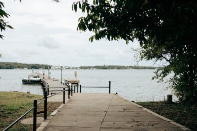 AI-generated travel thumbnail for Caué District