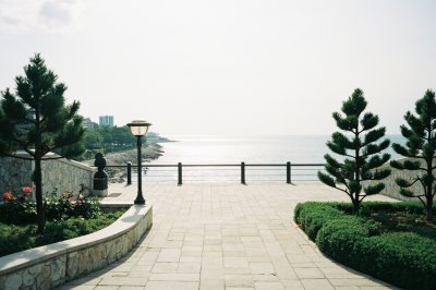 AI-generated travel thumbnail for Izumisano Shi