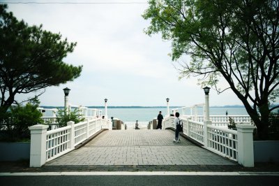 AI-generated travel thumbnail for Komae-shi