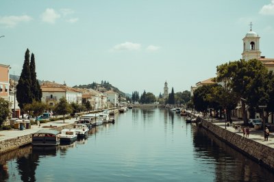 AI-generated travel thumbnail for Meana Sardo