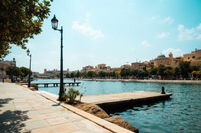 AI-generated travel thumbnail for Paola
