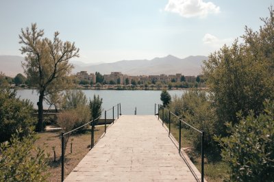 AI-generated travel thumbnail for Shahrak Mes Sarcheshmeh