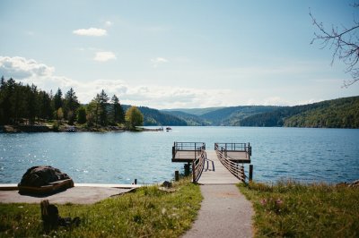 AI-generated travel thumbnail for Tainter Lake