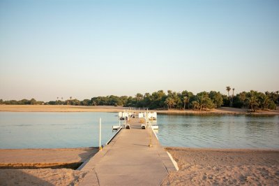 AI-generated travel thumbnail for Wad Rāwah